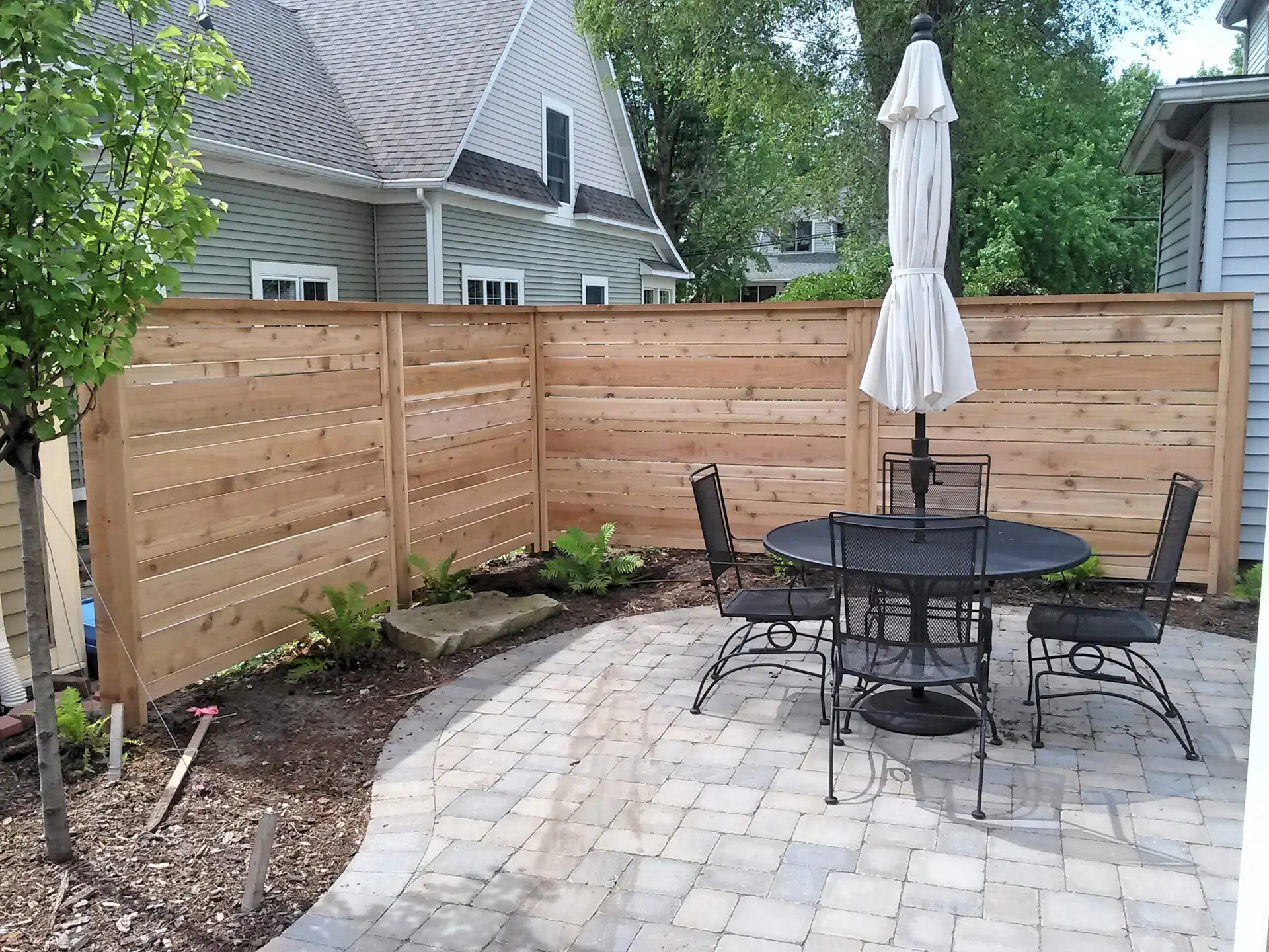 Custom Cedar Horizontal Privacy Fence in Grand Haven, Michigan.