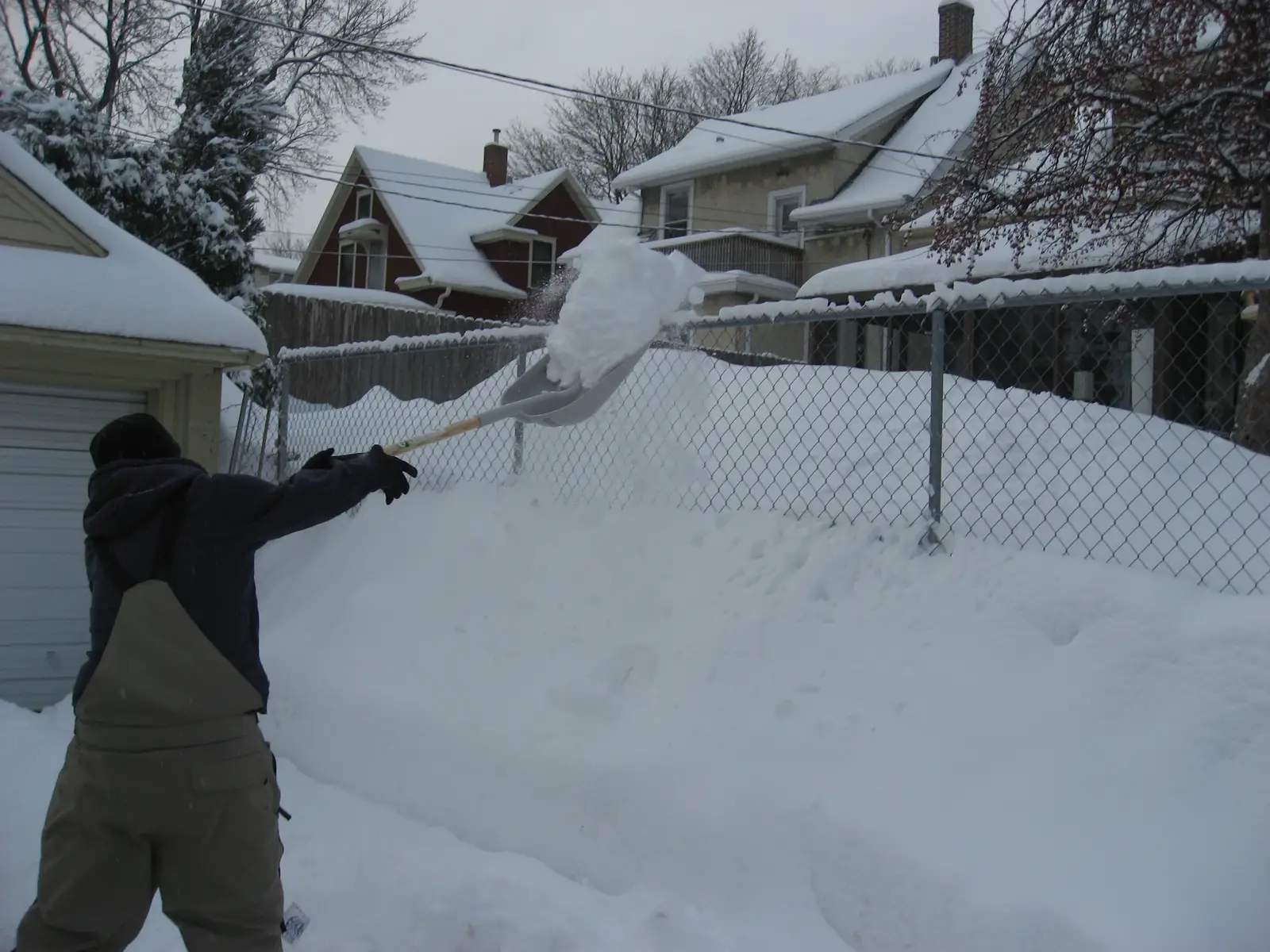 fence-covered-in-snow