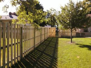 Custom Built, Treated Wood, Shadowbox Style, Wood Fence, in Hudsonville, Michigan.